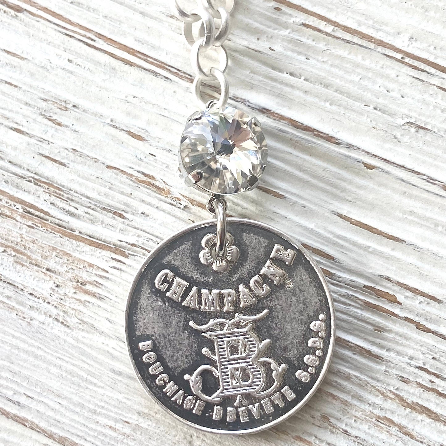 Champagne French coin necklace boutique salon jewelry: Burnished silver